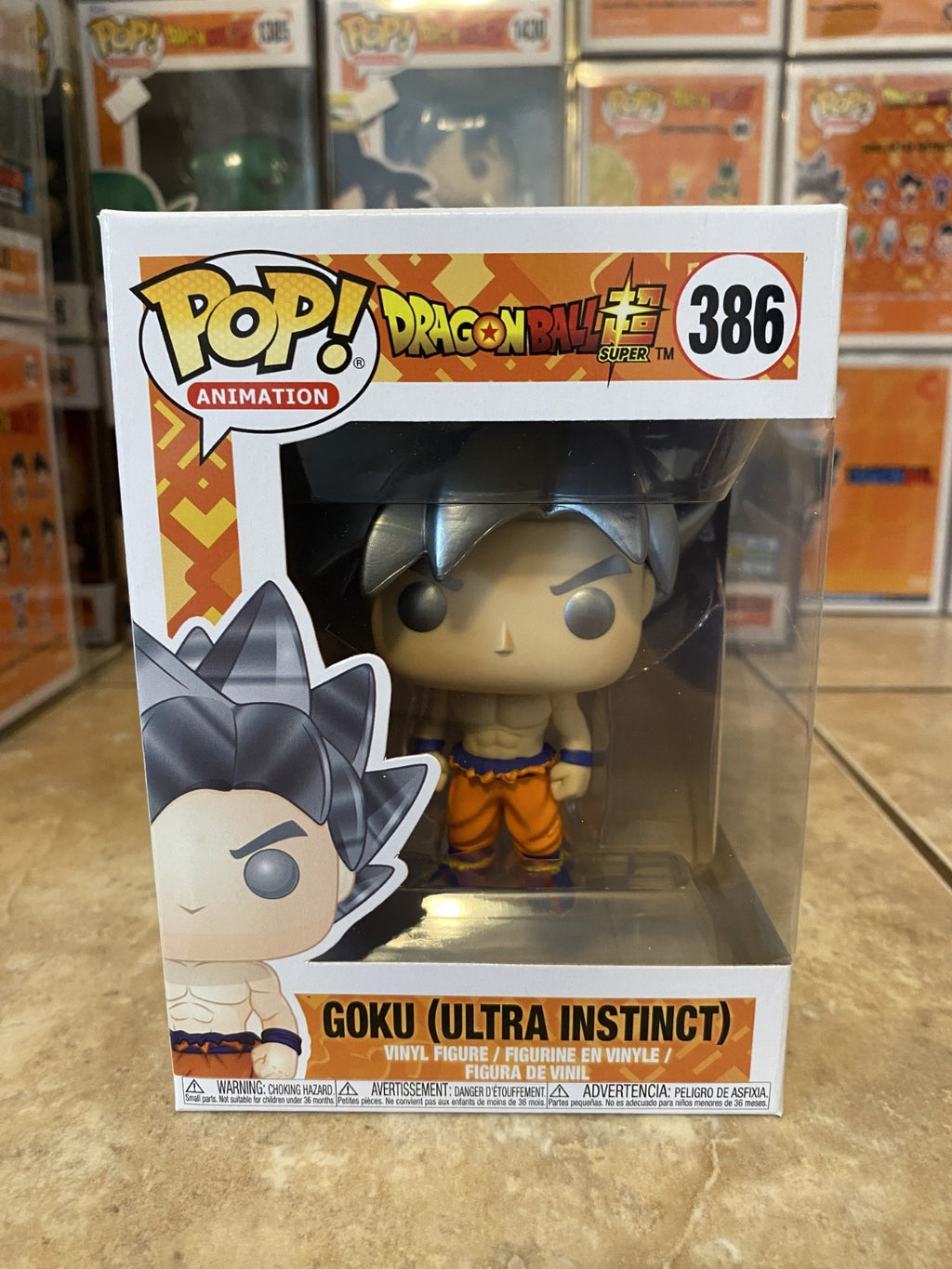 Funko Pop! Dragon Ball Super #386 Goku (Ultra Instinct) w Protector