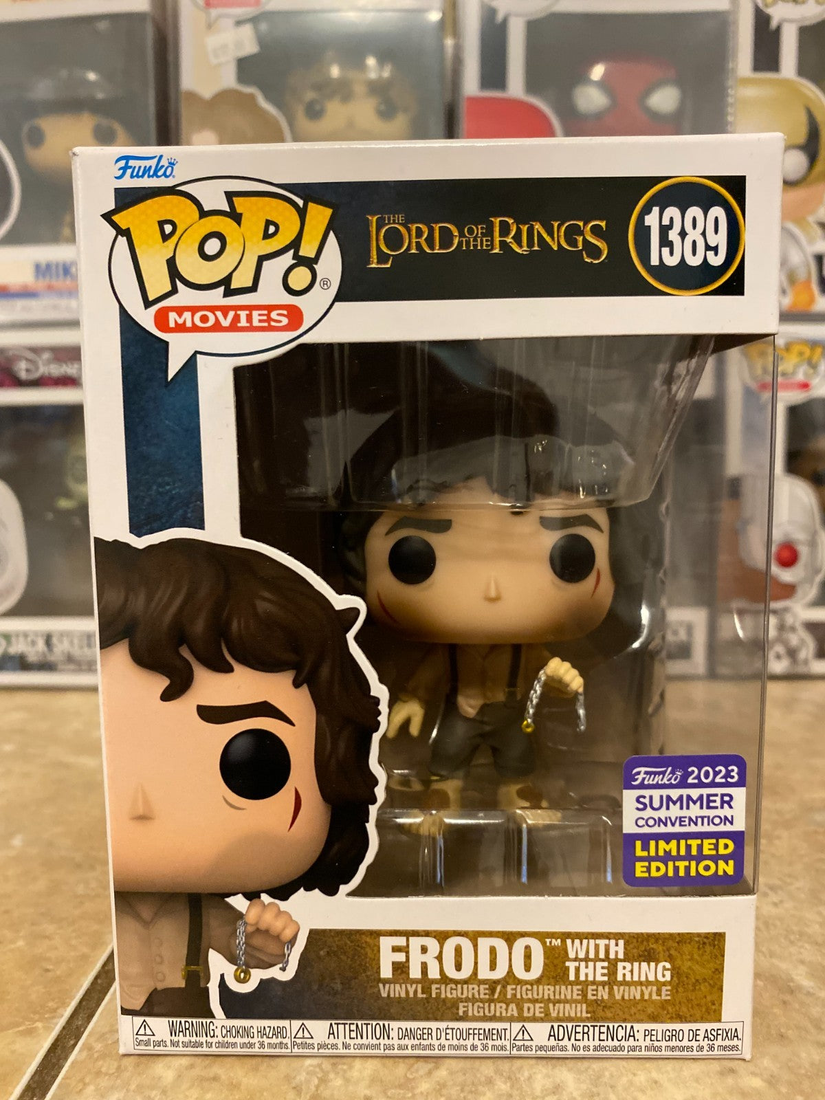 Funko Pop! Vinyl: The Lord of the Rings - Frodo with the Ring w Protector