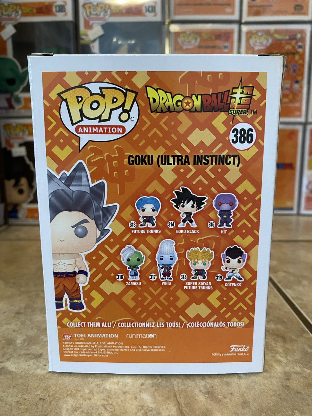 Funko Pop! Dragon Ball Super #386 Goku (Ultra Instinct) w Protector