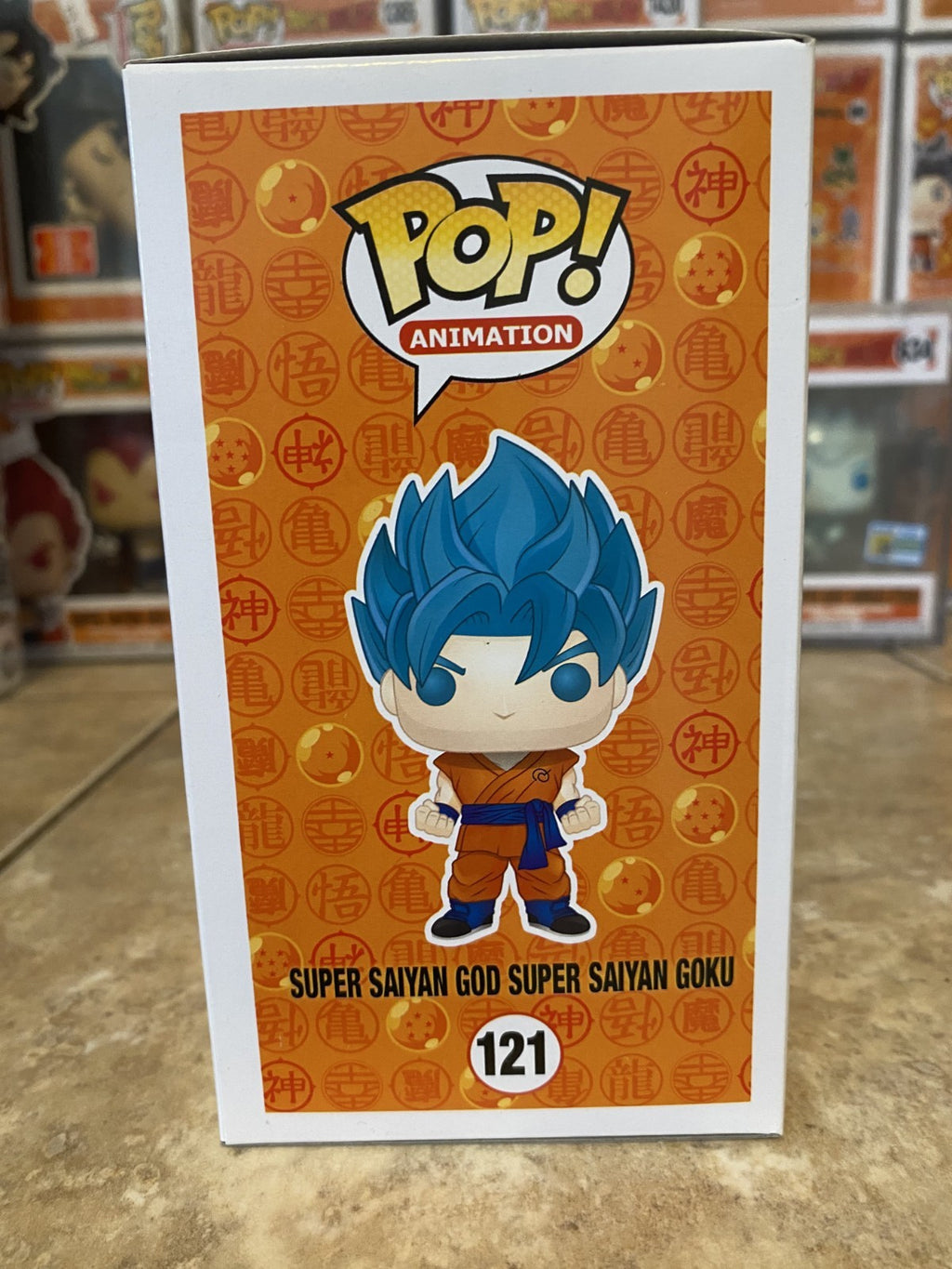 Funko Pop! Dragon Ball Z #121 Super Saiyan God Super Saiyan Goku w Protector