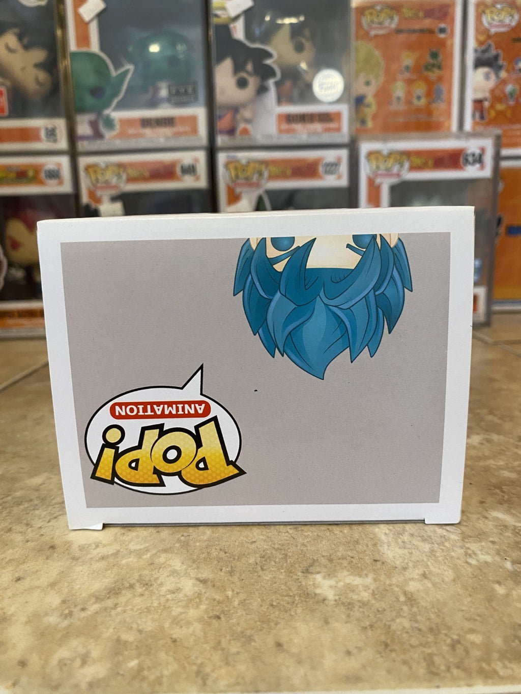 Funko Pop! Dragon Ball Z #121 Super Saiyan God Super Saiyan Goku w Protector