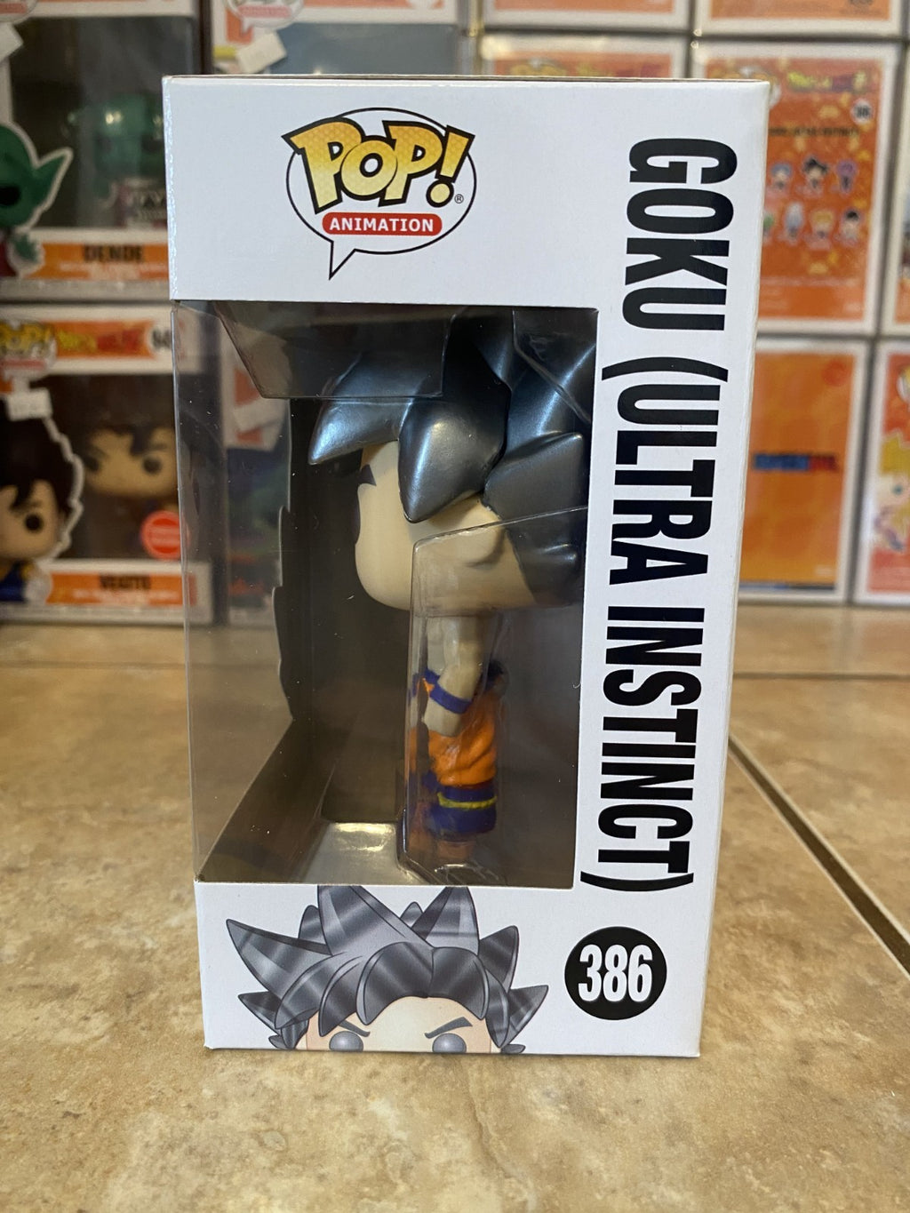 Funko Pop! Dragon Ball Super #386 Goku (Ultra Instinct) w Protector