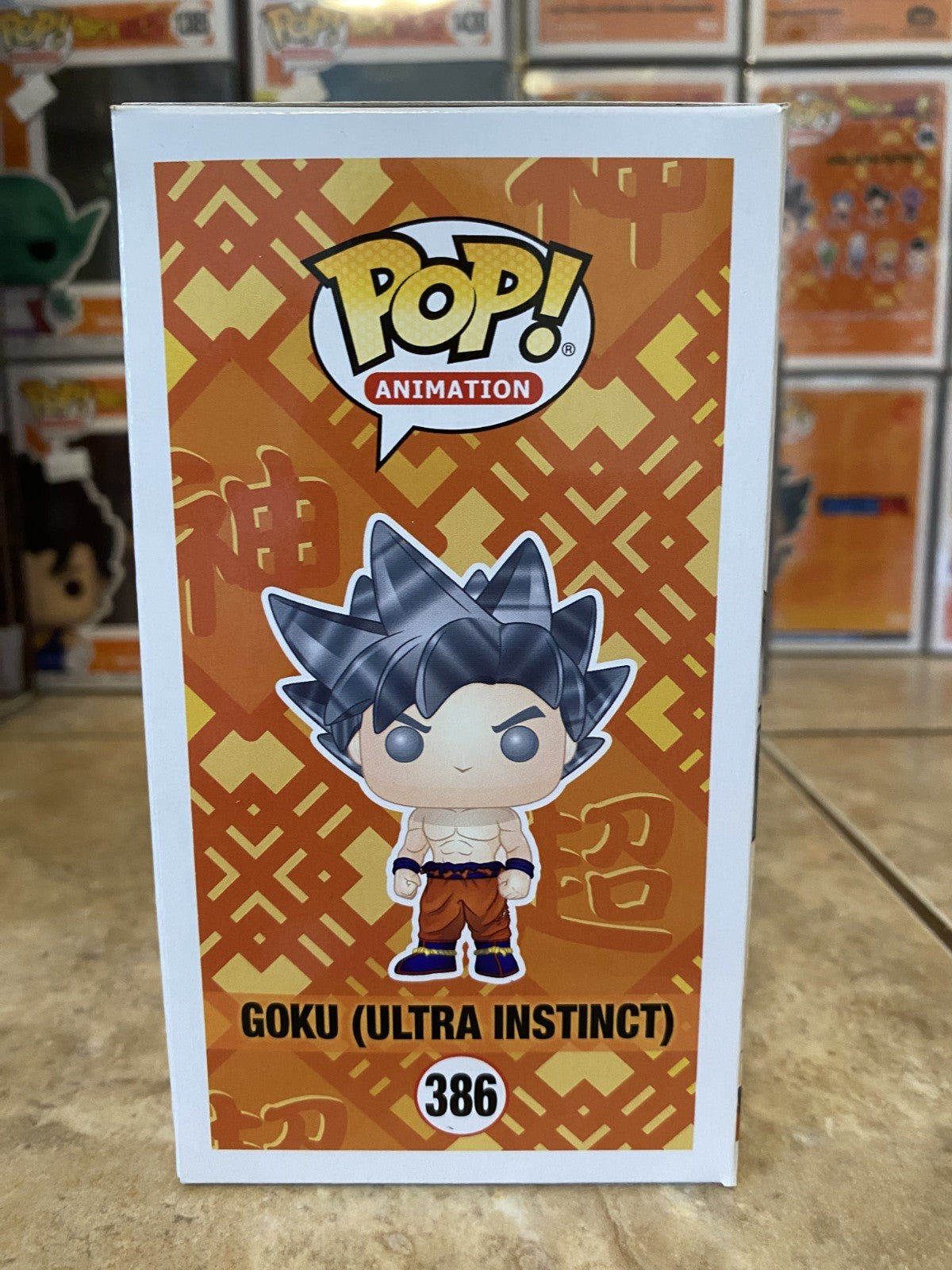 Funko Pop! Dragon Ball Super #386 Goku (Ultra Instinct) w Protector