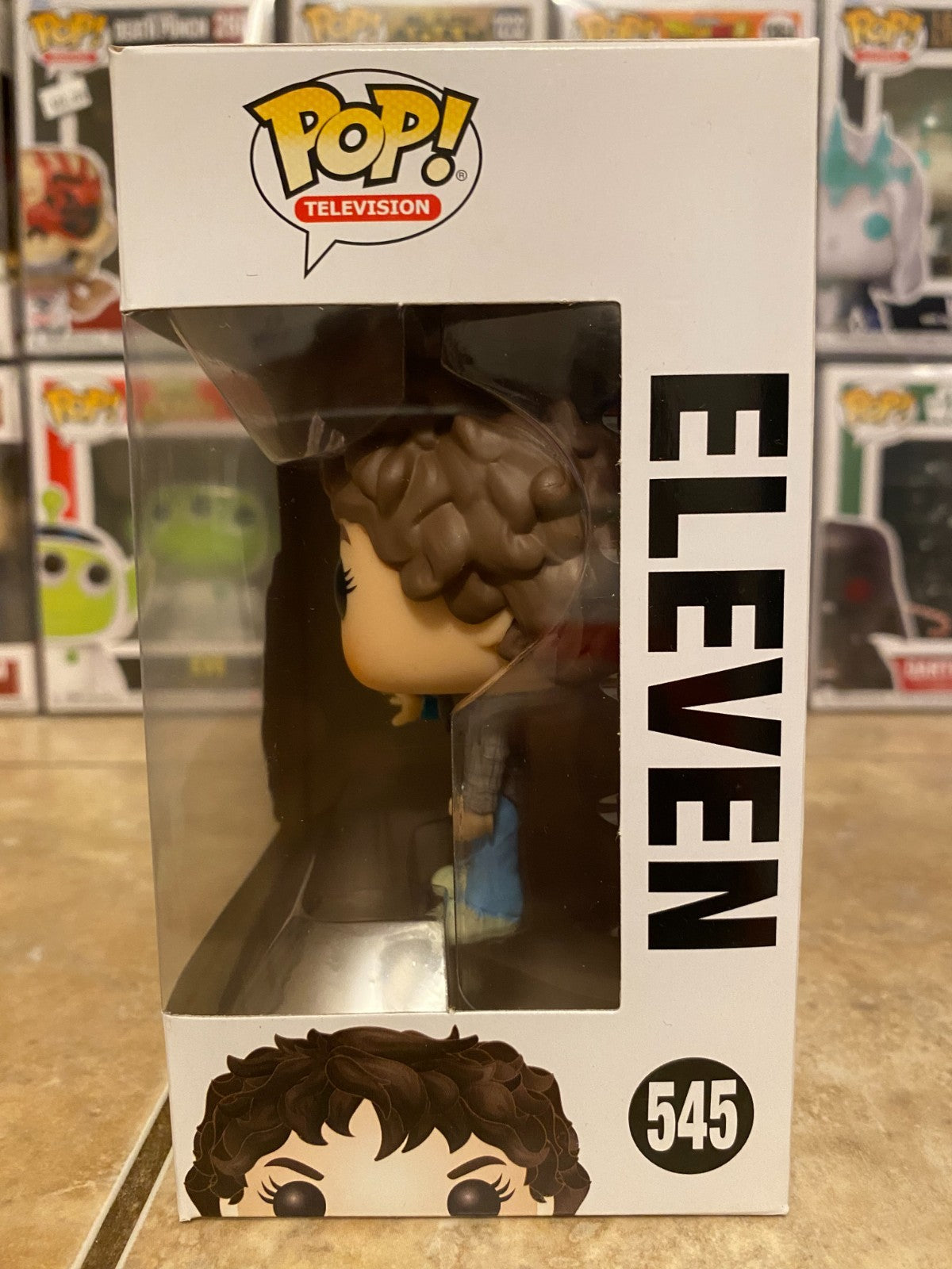 Funko Pop! Vinyl: Stranger Things - Eleven #545 w Protector