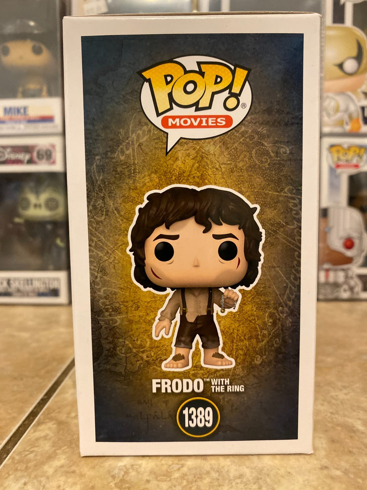 Funko Pop! Vinyl: The Lord of the Rings - Frodo with the Ring w Protector